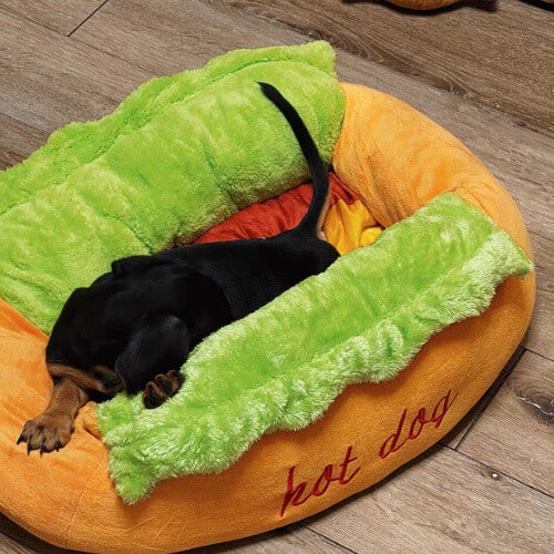 Cat curled up sleeping in the Hot-Dog Plush Pet Bed