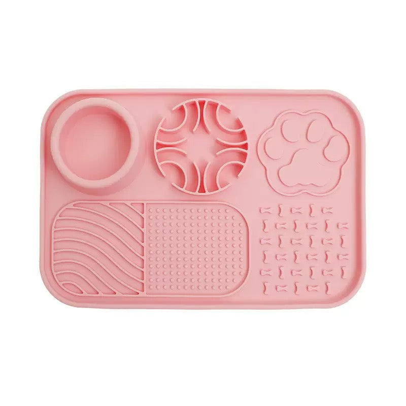 Cat licking treats off the silicone slow feeder mat