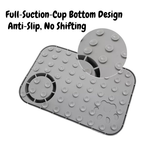 Lick mat suction-cupped to a bathtub wall for bath time distraction
