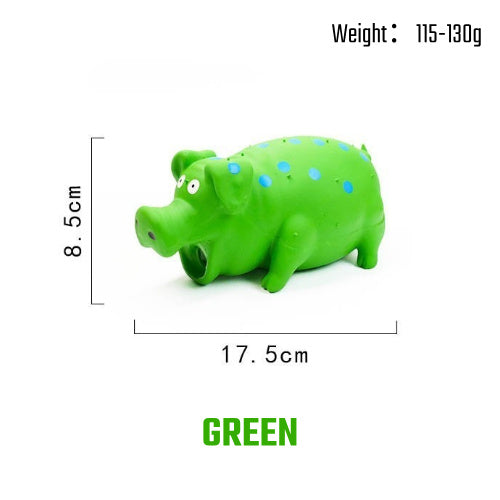 Squeaky Pig Dog Toy being carried by a dog