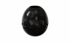 Black egg-shaped fillable dog toy on a white background