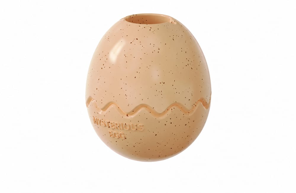 Cream egg-shaped fillable dog toy with speckled finish and top opening