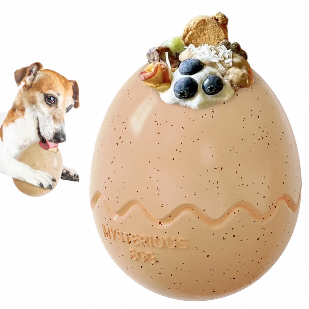 Cream egg-shaped dog toy filled with food, with a dog licking the opening