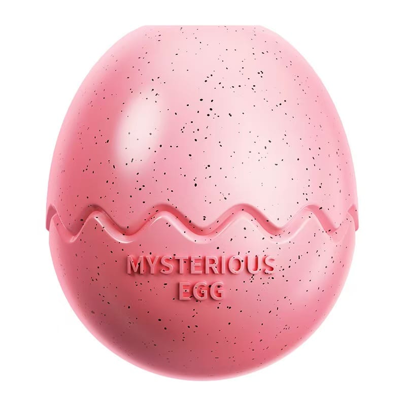 Pink speckled egg-shaped dog enrichment toy