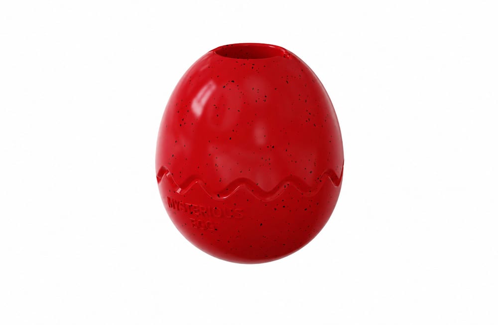 Red egg-shaped fillable dog toy with speckled finish